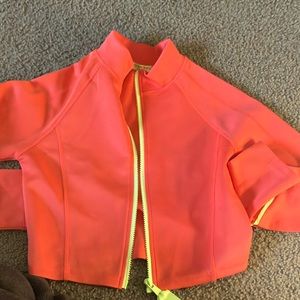 an orange cropped jacket